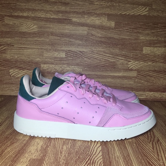 pink and green adidas shoes